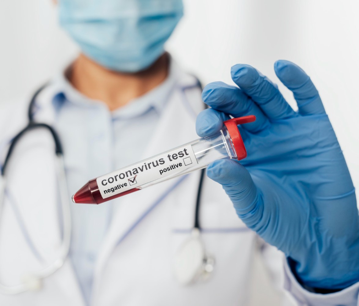 close-up-doctor-holding-coronavirus-test