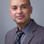 Adil Alavi, MD